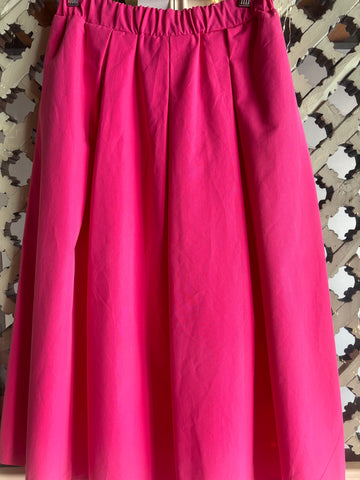 GONNA CON FALDONI COTONE FUXIA