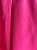 GONNA CON FALDONI COTONE FUXIA