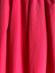 GONNA CON FALDONI COTONE FUXIA