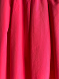 GONNA CON FALDONI COTONE FUXIA
