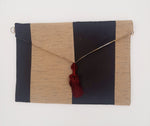 POCHETTE RIGATA NERO ORO CON NAPPINA BORDEAUX