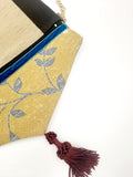 POCHETTE RIGATA NERO ORO CON NAPPINA BORDEAUX