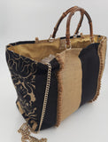 BORSA GRACE TESSUTO RIGA ORO NERA CON INTERNO JACQUARD ORO